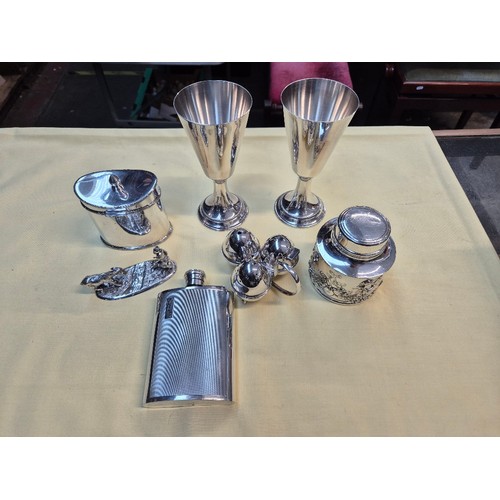 491 - A box of silver plated ware to include tea caddies, Art Deco hip flask, pair of Welsh goblets and de... 