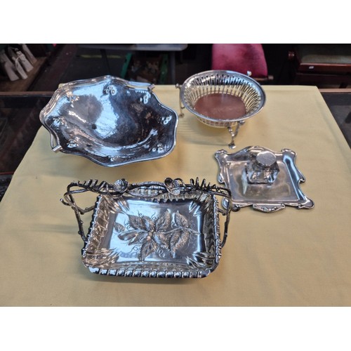 489 - A box of Art Nouveau, silver plated ware to include planished basket, inkwell on stand, strawberry b... 