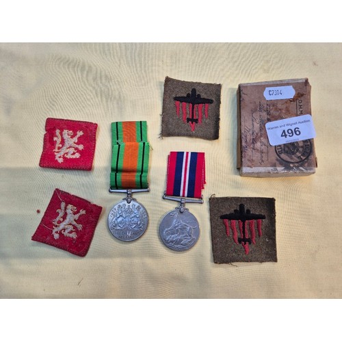 496 - Two Second World War medals and some ribbons