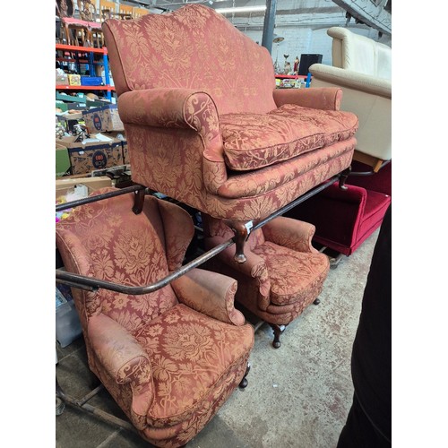 1004 - An early 20th century two seater settee and two matching armchairs.