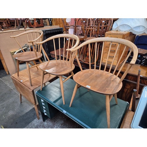 1010 - Three 1960s Ercol light elm 'Cowhorn' dining chairs, model 449A.