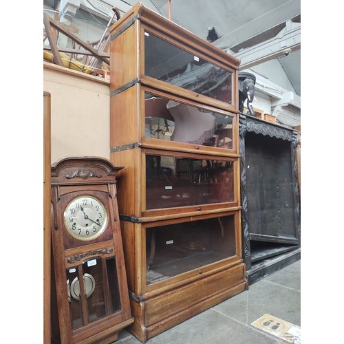 1020 - A Globe Wernicke mahogany sectional bookcase, height 161cm.