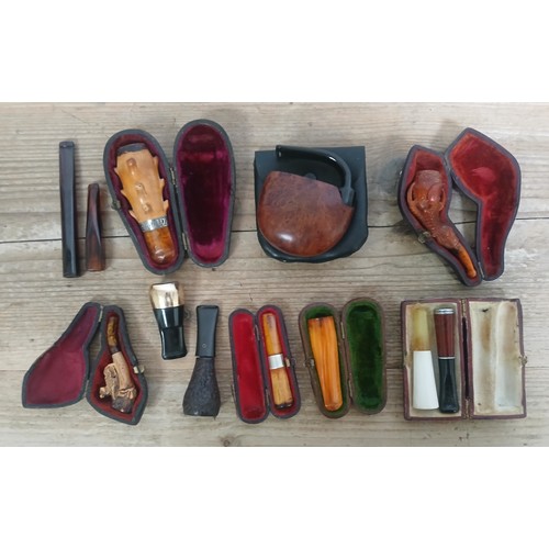 224 - A collection of mainly antique/vintage cheroot holders and pipes.