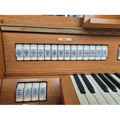 2 - A Viscount Domus 1232 oak cased electric organ.