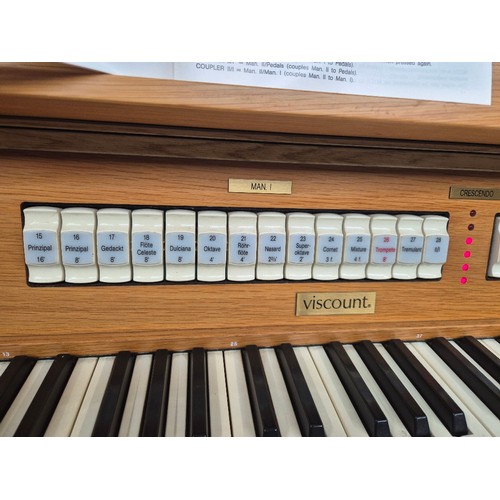 2 - A Viscount Domus 1232 oak cased electric organ.