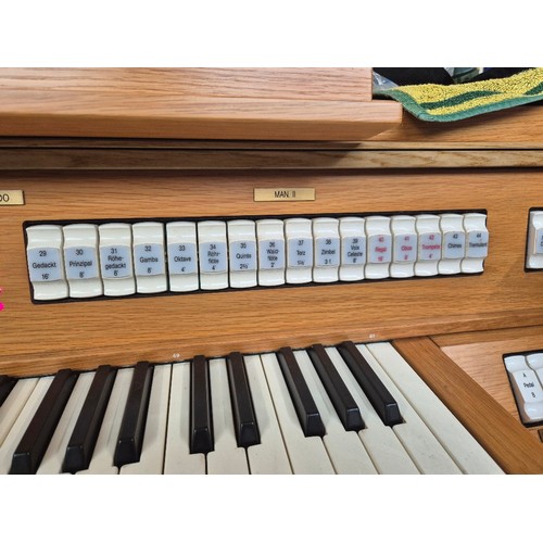 2 - A Viscount Domus 1232 oak cased electric organ.