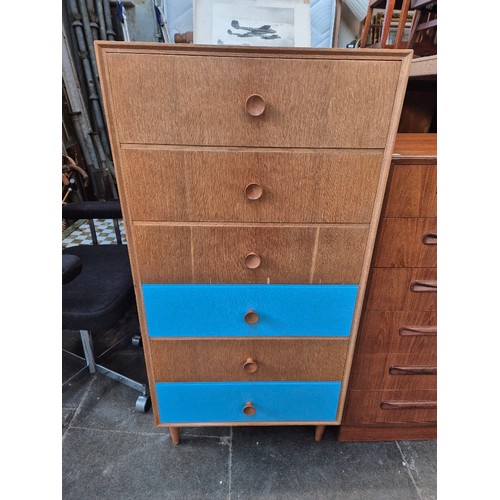 1025 - A retro light oak tall chest of drawers.