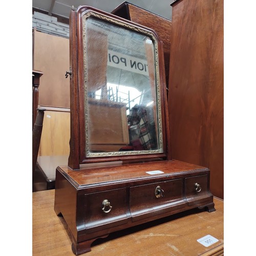 1015 - A Georgian mahogany toilet mirror.