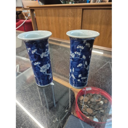 454 - A pair of Chinese blue and white sleeve vases, bearing four character Kangxi marks, height 15cm.