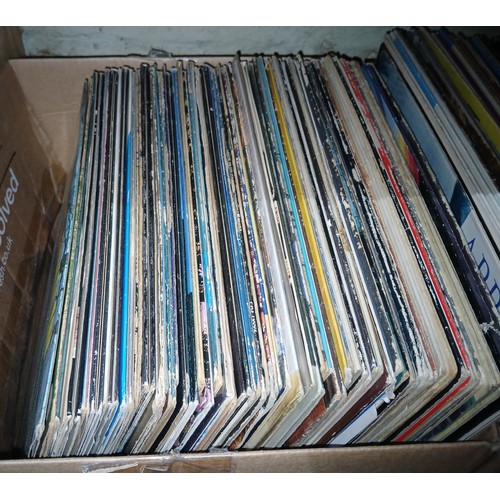 486 - A box of around 60 classic rock and pop albums from the seventies to include Yes, Eagles, Cat Steven... 