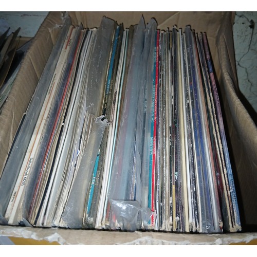 494 - A box of assorted LPs and 12