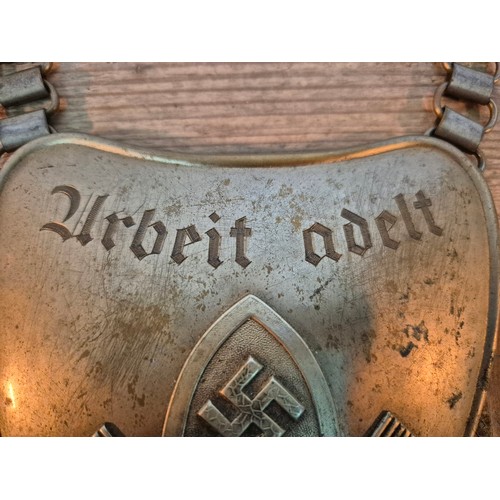 50 - A German Third Reich WWII standard bearer's gorget inscribed 'Arbeit Aldelt'.