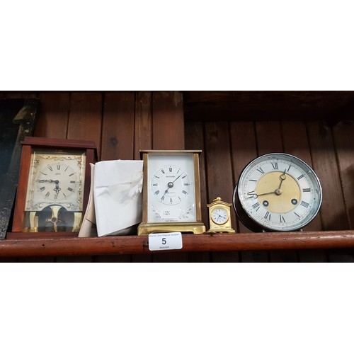 5 - Four clocks including a Schatz 400 day clock, a Metamec Quartz carriage clock and two others