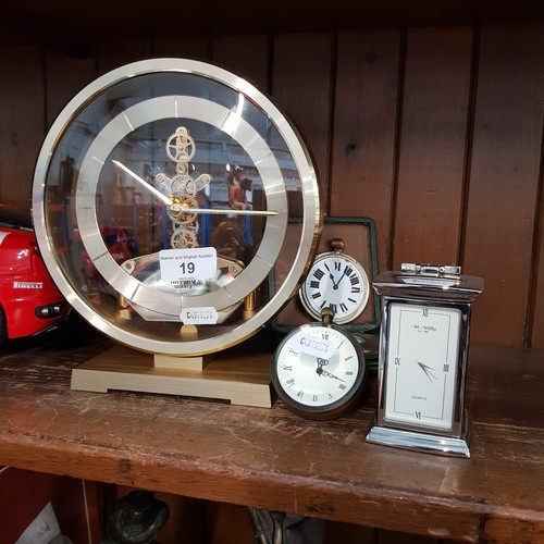 19 - A stainlees steel carriage clock, a ball clock, a desk clock (AF) and a modern mantle clock