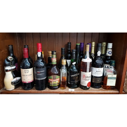 54 - A collection of alcohol to include red wine, port, mulled wine, dark rum, soarkling perry, Sheridans... 