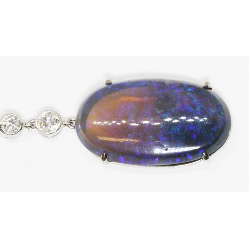 1 - AN OPAL AND DIAMOND PENDANT NECKLACE, early 20th century, two double sided oval opal cabochons four ... 