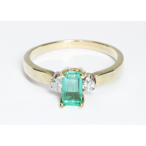 7 - An emerald and diamond ring, the emerald measuring approximately 7.15mm x 4.20mm, depth 3.12mm, set ... 