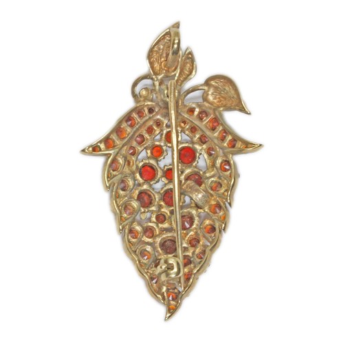 28 - A 9ct gold garnet brooch modelled as a strawberry, hallmarked, sponsor SJ, London 1977, length 50mm,... 