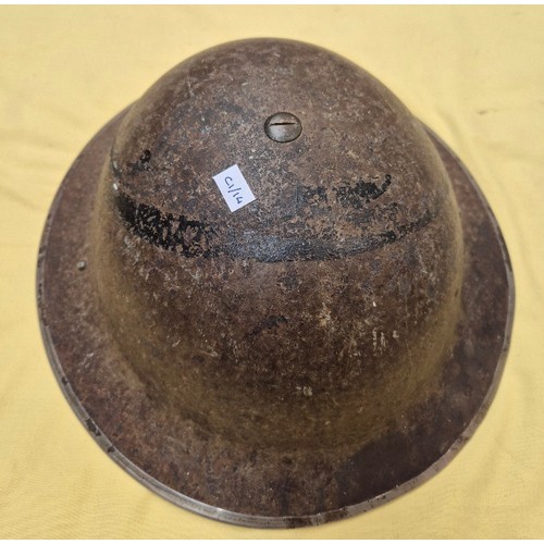 15 - WW11 British steel helmet dated1939 together with an American steel helmet.