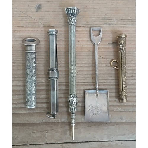 436 - A mixed lot comprising a hallmarked silver lapel posy holder,  two hallmarked silver propelling penc... 