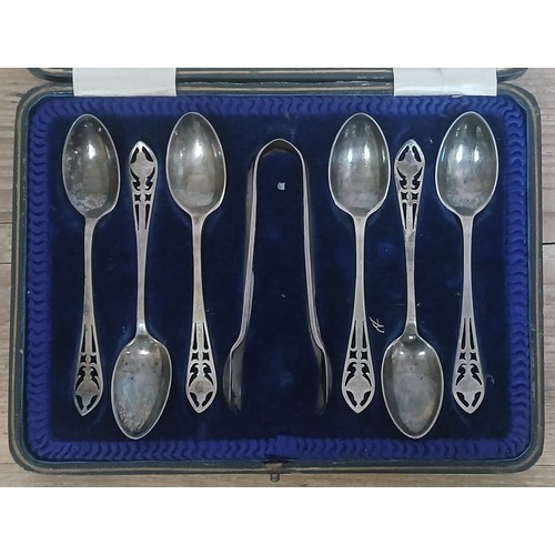 491 - A cased set of six hallmarked silver teaspoons and sugar tongs.