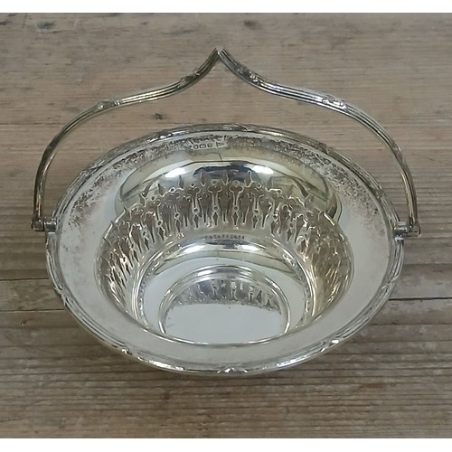 505 - A hallmarked silver basket with swing handle, Walker & Hall, height 12.5cm, weight 5oz 2dwt.