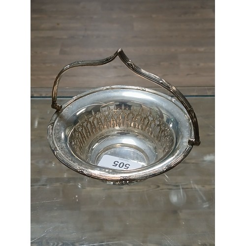 505 - A hallmarked silver basket with swing handle, Walker & Hall, height 12.5cm, weight 5oz 2dwt.