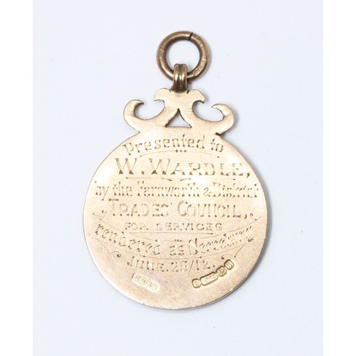 22 - A hallmarked 9ct gold presentation fob, length 43mm, weight 8.7g.