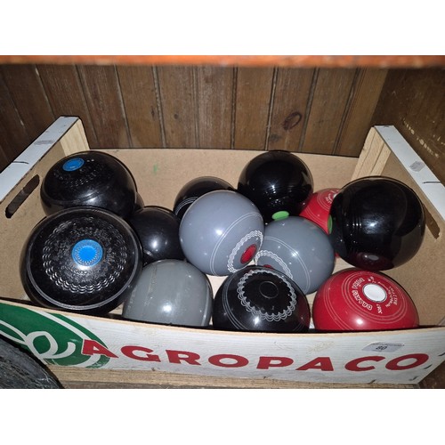 80 - Seven sets of crown green bowls including Drakes and Taylors.