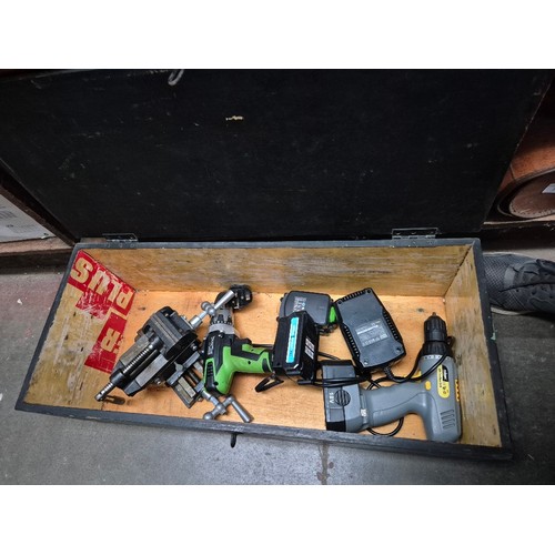 77 - A tool box and contents including a lathe cross vice, drills etc.