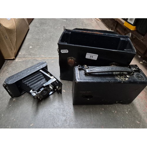71 - Two vintage Kodak cameras, one with case.