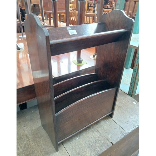An oak book trough/magazine rack.