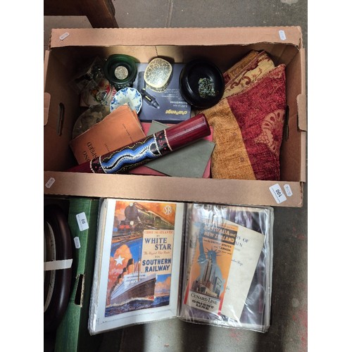 100 - An album of assorted maritime ephemera including photographs, shipping line travel guides, Cunard, Q... 