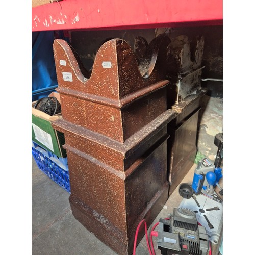 114 - A pair of salt glazed chimney pots, height 68cm.