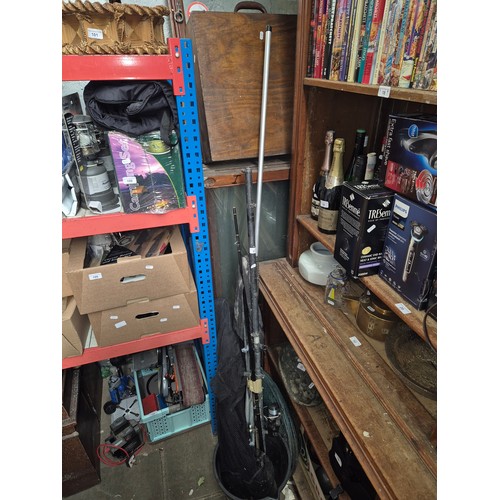 81 - Various fishing rods, keep nets and landing nets
