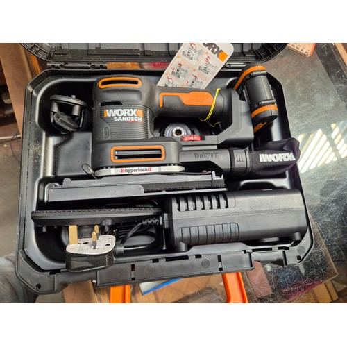 64 - A Worx Sandeck cordless sander with battery and charger