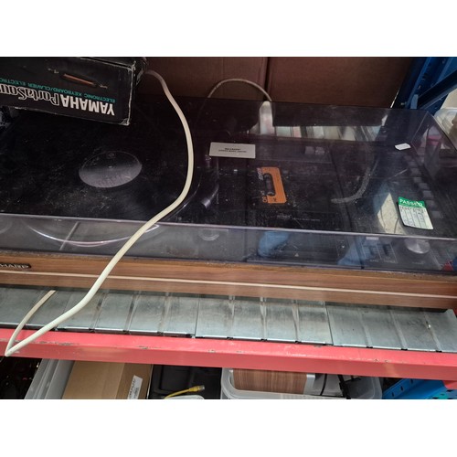 142 - 3 shelves (9 boxes) of electrical items including hifi, radios, Yamaha portasound, Sharp record deck... 