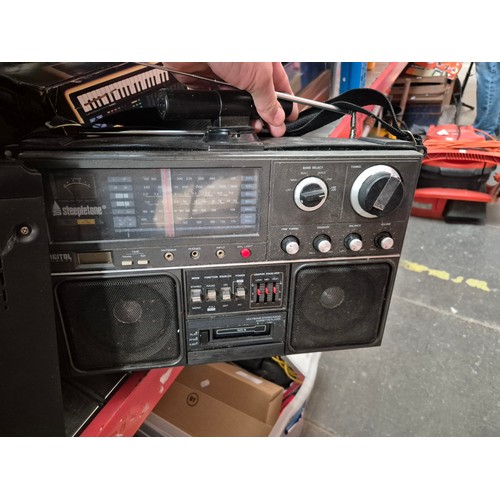 142 - 3 shelves (9 boxes) of electrical items including hifi, radios, Yamaha portasound, Sharp record deck... 