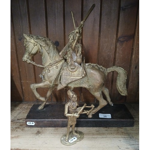 36 - An African brass sculpture depicting Lat Dior of Senegal, previously gifted from the Chief of Staff ... 