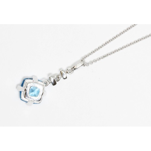 40 - DAVID M ROBINSON, an 18ct white gold blue topaz and diamond pendant necklace, length 22mm, hallmarke... 