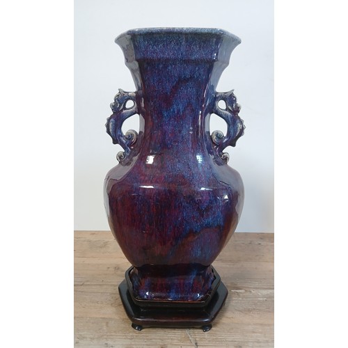 613 - A Chinese porcelain flambe glaze baluster vase with dragon handles, unmarked, 18th/19th century, hei... 