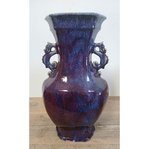 613 - A Chinese porcelain flambe glaze baluster vase with dragon handles, unmarked, 18th/19th century, hei... 