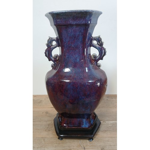 613 - A Chinese porcelain flambe glaze baluster vase with dragon handles, unmarked, 18th/19th century, hei... 