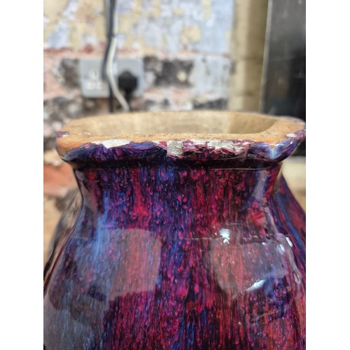 613 - A Chinese porcelain flambe glaze baluster vase with dragon handles, unmarked, 18th/19th century, hei... 