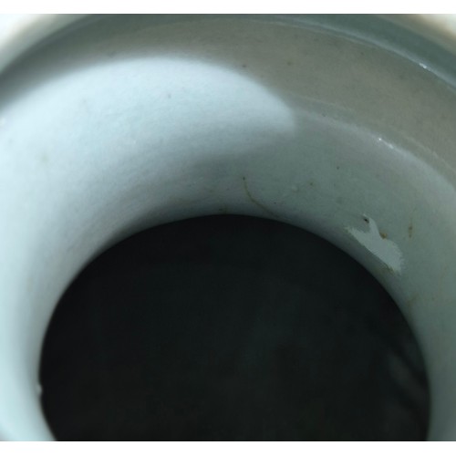 614 - A Chinese porcelain baluster vase decorated in red and blue underglaze depicting a dragon amongst cl... 