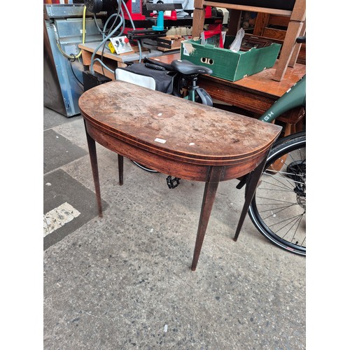 1026 - A George III fold over top tea table.