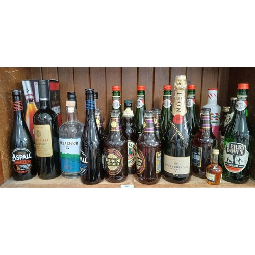 56 - 23 bottles of assorted alcohol.