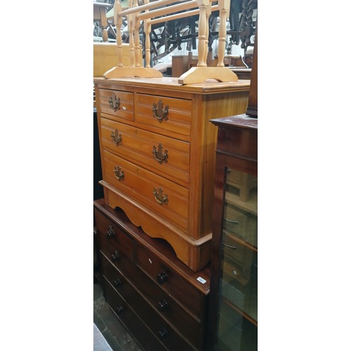 Two antique chests of drawers and two towel rails.