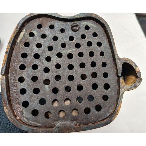 6 - A cast metal mechanical money bank.