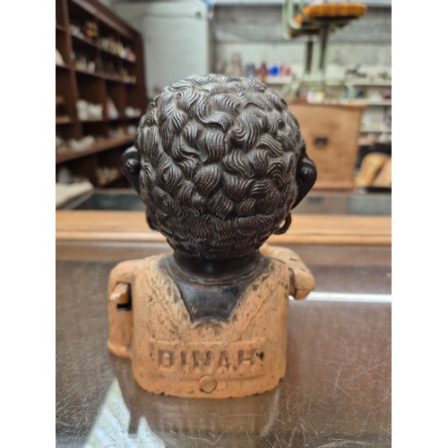 6 - A cast metal mechanical money bank.